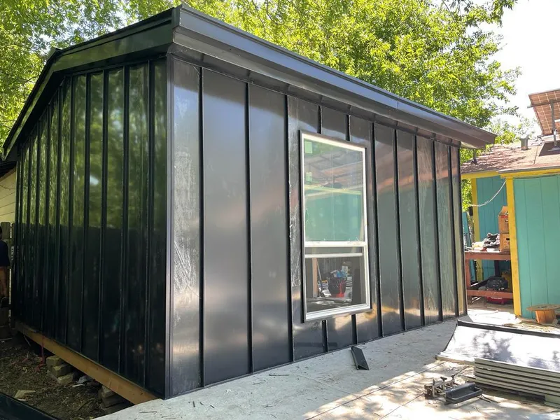 Black standing seam metal wall panels for Metal Roof Installation in Phillipsburg